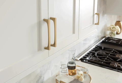 Merced 6-5/16 Inch Center To Center Champagne Bronze Cabinet Pull for cabinets installed on white kitchen cabinets