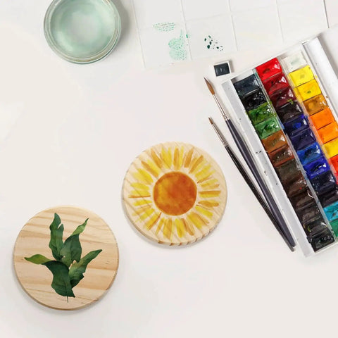Unfinished Wood Coasters Set 24 Round 4 Inch Blank Drink Coasters With 96 Non Slip Foam Knots for painting and craft projects.