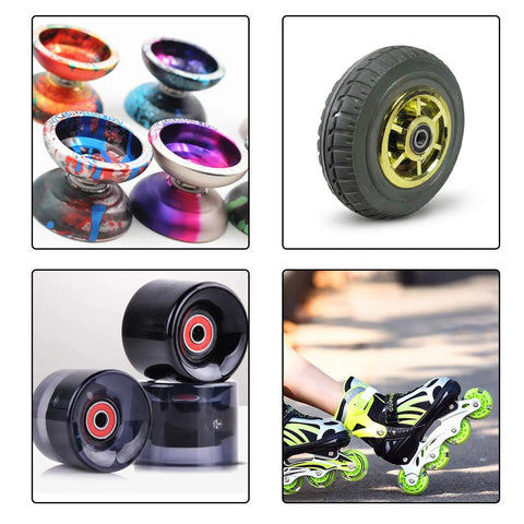 Yo-yo set, four colorful metal yo-yos, front view
Inline skate wheel, side view with black tire and gold hub
Inline skate wheels, close-up with red bearings and dark housings
Inline skates worn by a person outdoors, on-feet view