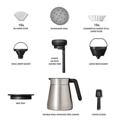 Components of 12 Cup Coffee Maker With Podless Single Serve Function in Silver including filters, baskets, carafe, and scoop.