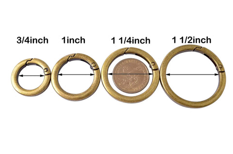 4 Pack Round Carabiner Key Rings With Spring Snap Clips And Flat O Rings In Brushed Brass Finish, shown in various sizes.