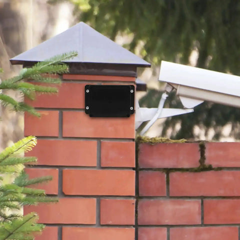 Durable Waterproof Outdoor Electrical Box Plastic Enclosure With Fixed Ear 115x90x55mm Black mounted on brick wall outside