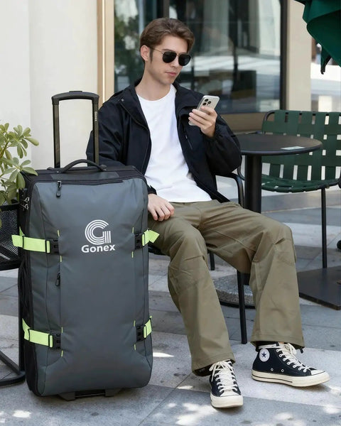 Rugged Rolling Duffle Bag With Wheels For Travelers, Water Repellent 30 Inch Nylon Large Wheeled Travel Duffle Luggage With TSA Lock And Telescopic Handle, 100L Capacity, Green Gonex