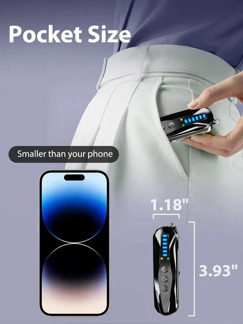 Infrared Pin Hole Camera Finder And Wireless Detector in hand next to phone, showing pocket-sized dimension for travel.