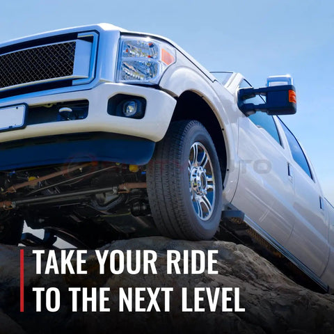 White truck on rocky terrain, emphasizing durability and performance