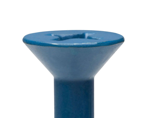 Close-up of flat head of One Quarter Inch By Two And Three Quarters Inches Flat Phillips Concrete Screw With Diamond Point Self Tapping Masonry Fastener