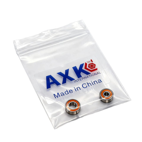 AXK dual bearing set in bag: SMR115-2RS CB (5x11x4mm) and S623-2RS CB (3x10x4mm), orange-sealed bearings