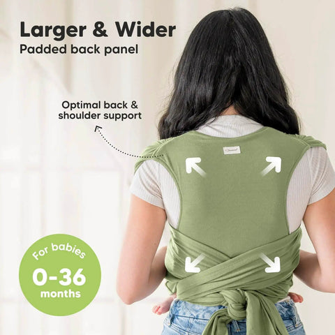 Back view of woman wearing green D Lite Baby Wrap Carrier Ring Sling For Newborn To Toddler with padded panel and adjustable ties.