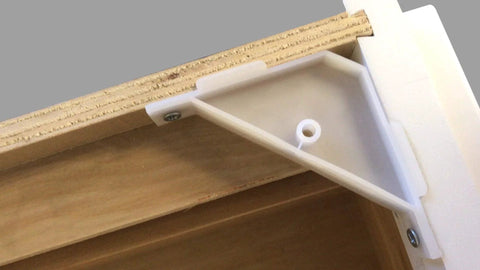 12 Pack 90 Degree Cabinet Triangle Brackets White Durable Plastic Corner Support Braces With Off Center Screw Holes installed