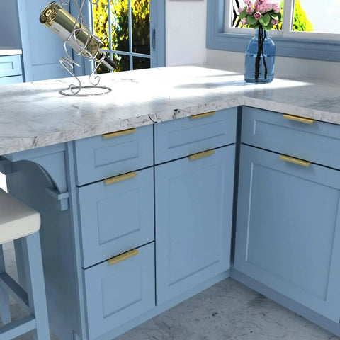 Elegant kitchen with blue cabinets featuring Five Pack Finger Edge Pulls For Gold Cabinet Hardware And Drawer Handles, installed view.