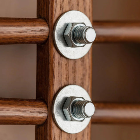 Flat washers with bolts and nuts, stainless steel, mounted on a wooden post (2 shown)