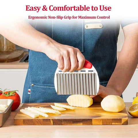 Person slicing potatoes with a Crinkle Cutter Stainless Steel Potato Slicer For Waffle Fries And Ripple Chips on a wooden board.