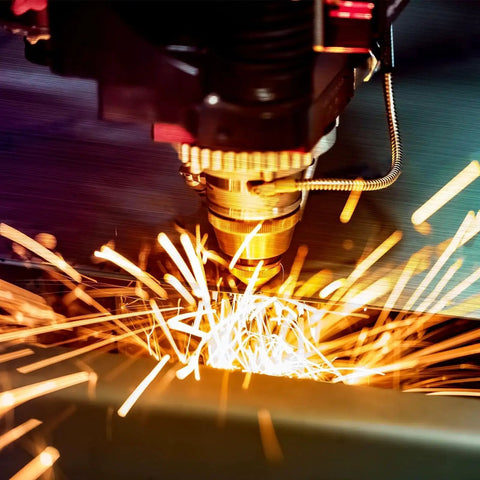 Laser cutting stainless steel sheet in workshop