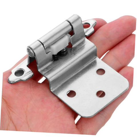 Close-up of a hand holding a metal hinge from the 8 Pack Heavy Duty Self Closing Inset Cabinet Hinges For Kitchen And Bathroom Cabinets Flush Mount Hardware
