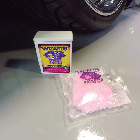 All Metal Polish For Silver Brass Stainless Aluminum Car Care With Slick High Gloss Finish And Instant Shine 3oz shown with packaging on garage floor