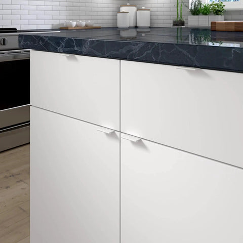 Lincoln Collection 1 5/16-Inch Center-To-Center White Modern Cabinet And Drawer Edge Pull Handle installed on kitchen cabinet