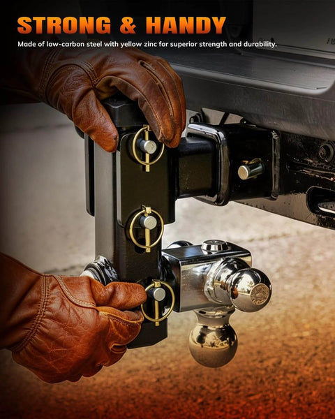 Person adjusting 30 Piece Heavy Duty Lynch Pin Assortment Kit with zinc plated steel pins on a trailer hitch, universal fit for farm implements.