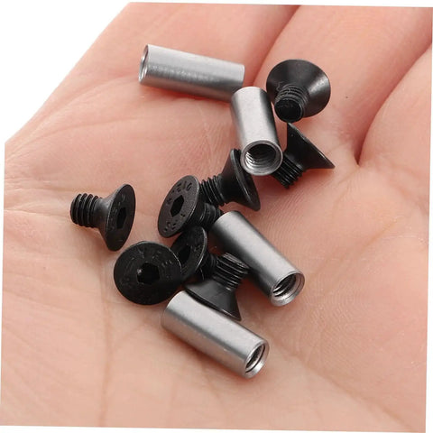 Close-up of 4 Piece Knife Handle Rivet Set for Easy Knife Repair and Installation held in hand, showing alloy steel rivets.