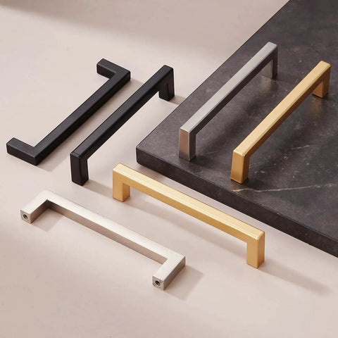 Various colored cabinet handles, including Matte Black Cabinet Handles Set Of 10, 5 Inch Center To Center, on display.
