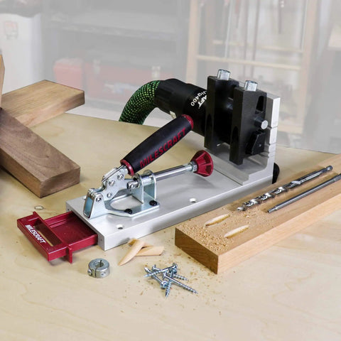 Pocket Hole Jig 400 Self Clamping Kit With Adjustable Bushing Blocks And Two Three Eighths Drill Guides setup on workbench.