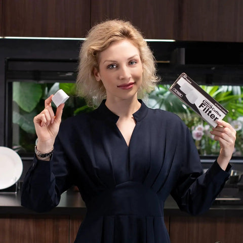 Front view: 18-pack charcoal water filters for Breville BWF100, held by a woman with a white filter cube.