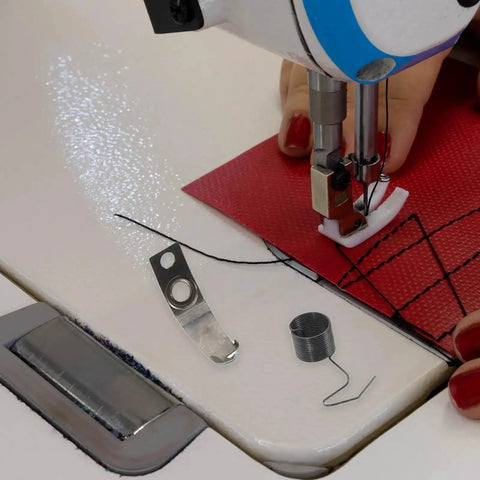 Person using sewing machine with Pro Grade Sewing Machine Replacement Screw Kit With Spring Set For Industrial Flat Machines visible