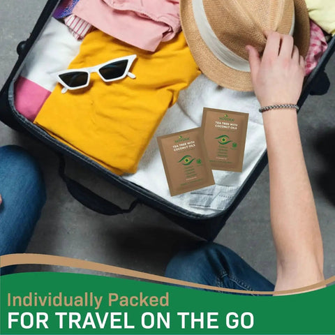 Tea Tree And Coconut Oil Eyelid And Lash Wipes Individually Wrapped For Demodex in open suitcase for travel