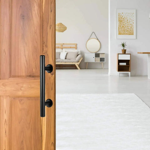 12 Inch Sliding Barn Door Handle Pull with Flush Back Plate, Matte Black Powder Coated Finish, installed on wooden interior door