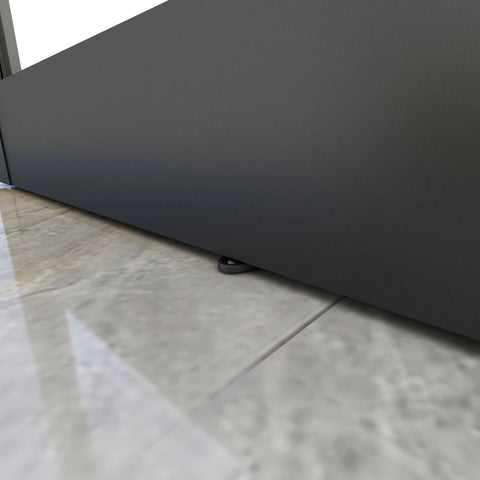 Close-up of Dope Mirrored Glass Sliding Barn Door In Black MDF With Hardware Kit showing bottom edge and floor guide.