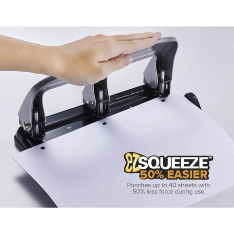Hand using EZ Squeeze Three Hole Punch With No Jam Technology Pushing Through 40 Sheets Effortlessly For Home Office Use