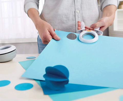 Person using 1 Inch Circle Squeeze Punch For Card Making And Scrapbooking Up To 2x Easier To Punch White And Navy Blue Craft Punch For Embellishments
