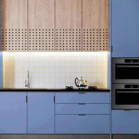 Contemporary kitchen with wooden upper cabinets and sleek concealed handles for drawers showcasing modern design.