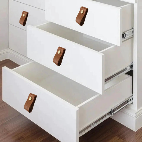 White drawers with 8 Pieces Leather Drawer Pulls Set With Brushed Gold Knobs For Cabinets And Furniture Dark Brown, installed.