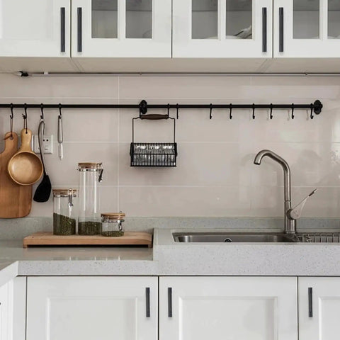 Modern kitchen with 10 Pack 5 Inch Matte Black Cabinet Handles For Cabinets And Drawers Durable Metal Pulls and smooth edges.