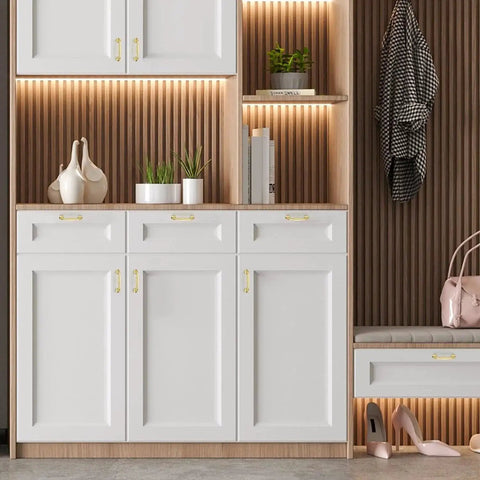 Modern kitchen with white cabinets featuring Brushed Brass 3 Inch Cabinet Handles Set Of 10 In Solid Zinc Alloy for door drawers.