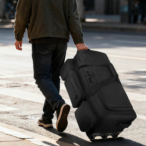 Man pulling Ultra Large 120L Rolling Duffle Bag With Wheels For Travel And Outdoor Adventures, Built Tough Military Grade Design
