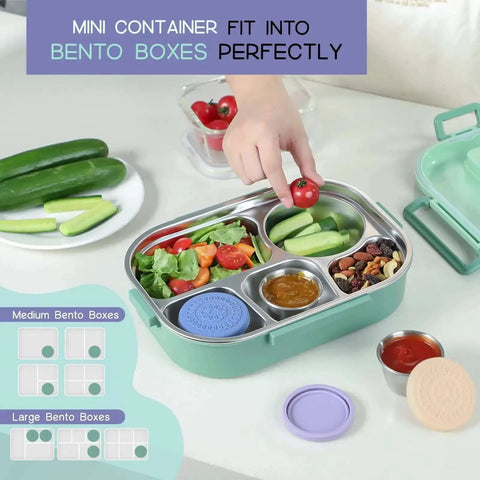 Lunch bento box with Eight Pack 2.4oz Stainless Steel Condiment Containers With Leakproof Silicone Lids filled with veggies and snacks