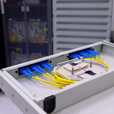 Network cabinet with ST to SC single mode fiber optic adapters, simplex couplers for high quality ST SC connector converters in distribution frames