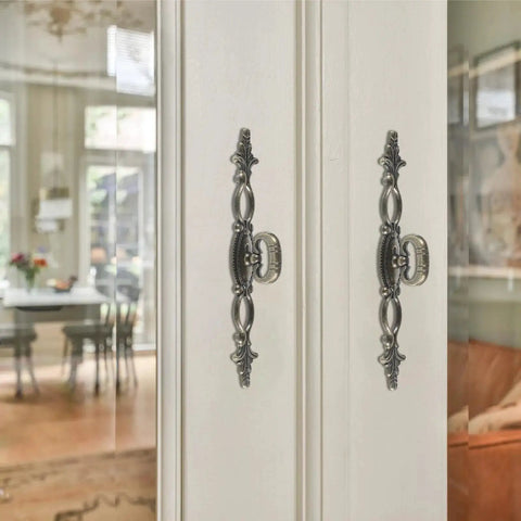 Vintage Style Antique Bronze Long Cabinet Handles 6.3 Inches, 2 Pack Hollow Drawer Pulls installed on white cabinet doors