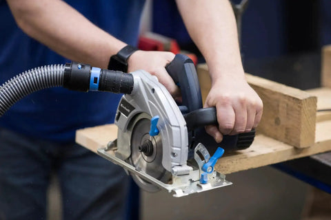 Using Sixteen Foot Flexible Vacuum Hose For Home And Shop Use With Multi Brand Dust Collection Adapters connected to saw