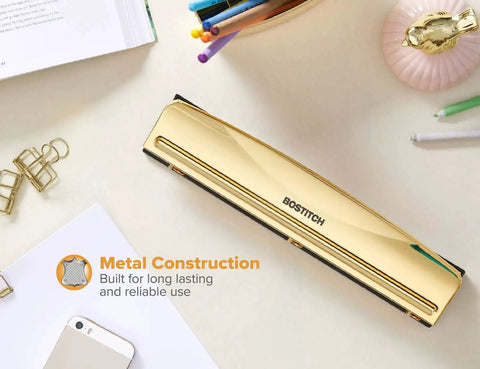 Gold 3 Hole Punch For 12 Sheets Durable Metal Office Punch With Stable Rubber Base on desk with stationery items.