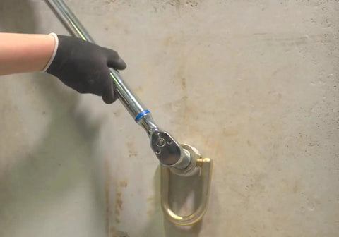 Installation of 10K Swivel Anchor Five Eighths Inch By Six Inches Expansion Anchor With Full Size D Ring In Zinc Plated Stainless Steel on concrete wall