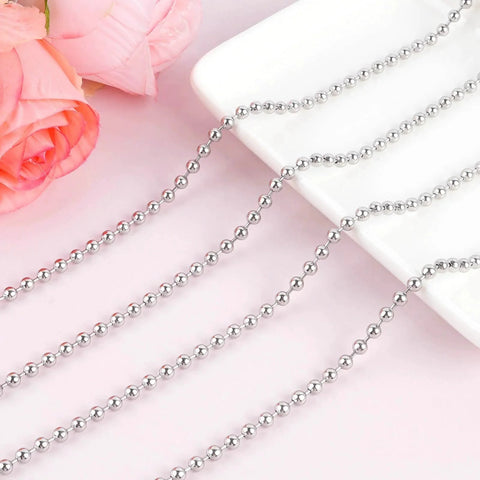 66 Foot Stainless Steel Ball Chain Kit 4.5mm Bead Chain With 100 Connectors And Pliers for blinds and DIY against pink background