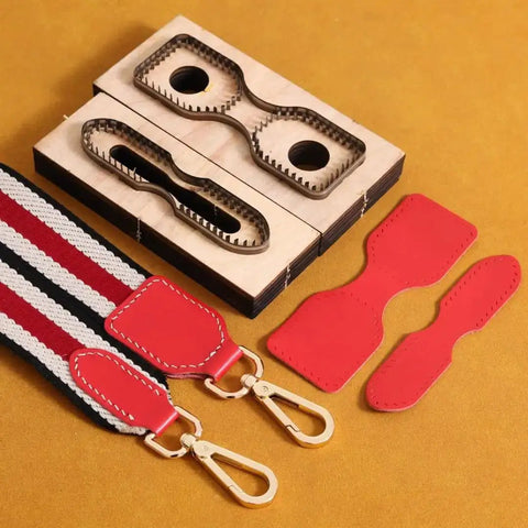 2 Piece Strap End Cutting Mold Set With Wooden Dies And Japanese Steel Cutters displayed with leather straps and cut templates