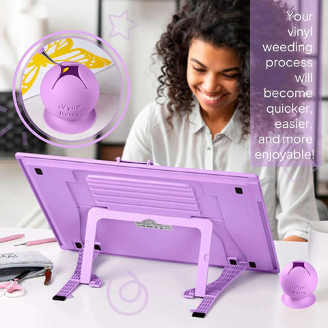 Berry Suctioned Vinyl Weeding Scrap Collector And Holder For Vinyl Weeding Tools With Star Shaped Opening Keeps Scrap Vinyl In Place And Makes Cleanup Easy For Crafters Purple By iVyne shown on crafting table.