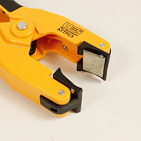 UEi ATTPC3 pipe clamp K-type thermocouple adapter for HVAC temp probes, yellow clamp with metal sensing pad.