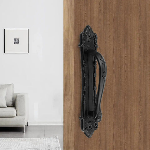 Vintage Black Sliding Barn Door Handle With Screws, Rustic Zinc Alloy Door Pull For Cabinets Gates Closets Sheds mounted on wooden door.
