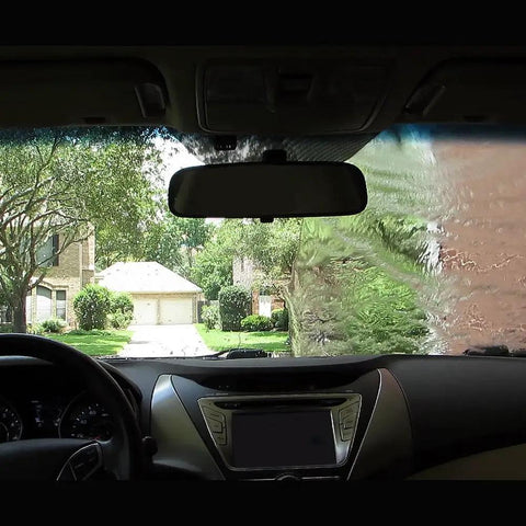 Water Repellent Glass Treatment For Rainy Day Driving That Boosts Visibility By Making Rain Bead Up And Slide Off The Windshield 473mL Bottle Rain X Original Glass Treatment applied on a windshield, showing clear visibility on one side and rain on the other.