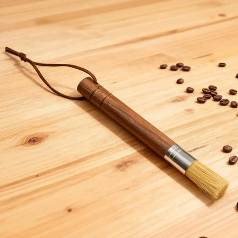 Grinder Cleaning Brush Set With Walnut Wood Handle And Natural Bristles For Espresso Machines And Home Baristas on wooden surface