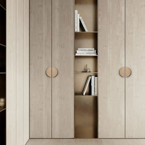 Walnut Wood Circular Cabinet Drawer Pulls Four Pairs Round Wood Grain Handles installed on light wood cabinets in a modern kitchen